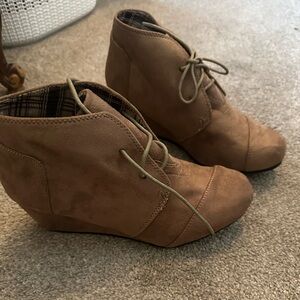 New never worn brown tan booties with a wedge heel. Sued